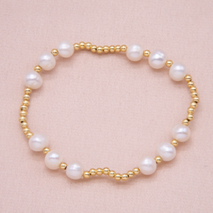 Pulsera  de perlas irregulares con bits en vermail