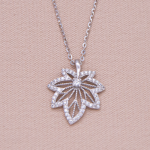 Juego de cadena y dije en plata diseño hoja calada con circones