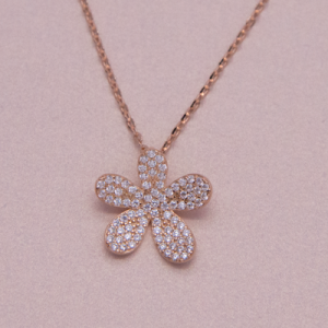 Juego de cadena y dije en oro rosado de flor con pavé de circones