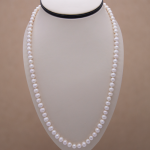 Collar largo perla semi-redonda