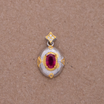 Dije ovalado de plata con Rubí