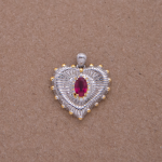 Dije de corazón con Rubi