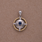 Dije circular con zafiro