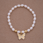 Pulsera de perla con dije de mariposa