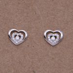 Aretes de silueta corazón doble