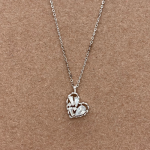 Juego cadena y dije silueta corazón con cristales