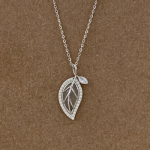 Juego cadena y dije de hoja con piedra cat eye