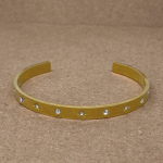 Pulsera bangle con circones