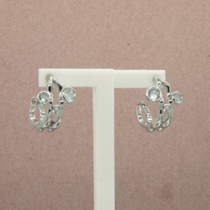 Arracada con cristales y líneas irregulares