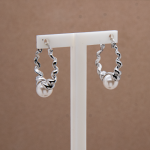 Arracadas diseño torcido con Madre Perla