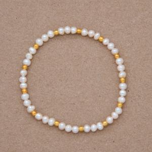 Pulsera perla cultivada y beads dorados