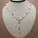 Collar corto diseño corbata con aquamarina y perla