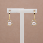Aretes largos con perla natural y circones diseño circulo