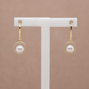 Aretes largos con perla natural y circones diseño circulo