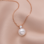 Dije con perla natural y circón