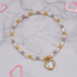 Pulsera de perla de arroz con dije de corazón