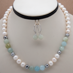 Juego de aretes y collar corto con perla, aquamarina y hematita