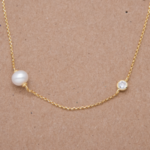 Collar con dije de perla y circón biselado