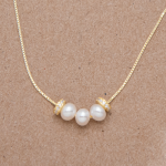 Collar con dije de 3 perlas y donitas