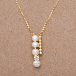 Collar con dije de 3 perlas y circón