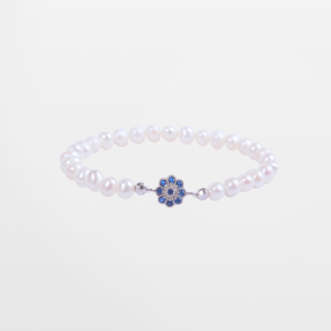 Pulsera para niñas con perlas y flor con circones