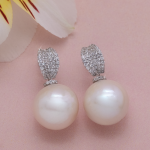 Aretes largos de plata con perla fina