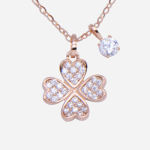 Juego de cadena con dije de plata con baño de oro rosado, diseño de flor con circones