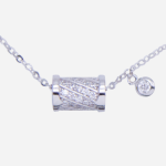 Juego de cadena de plata con diseño de cilindro con circones