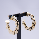 Arracadas grandes de chapa de oro de 18k torsal liso grueso